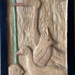 wood hand carving of 4 birds